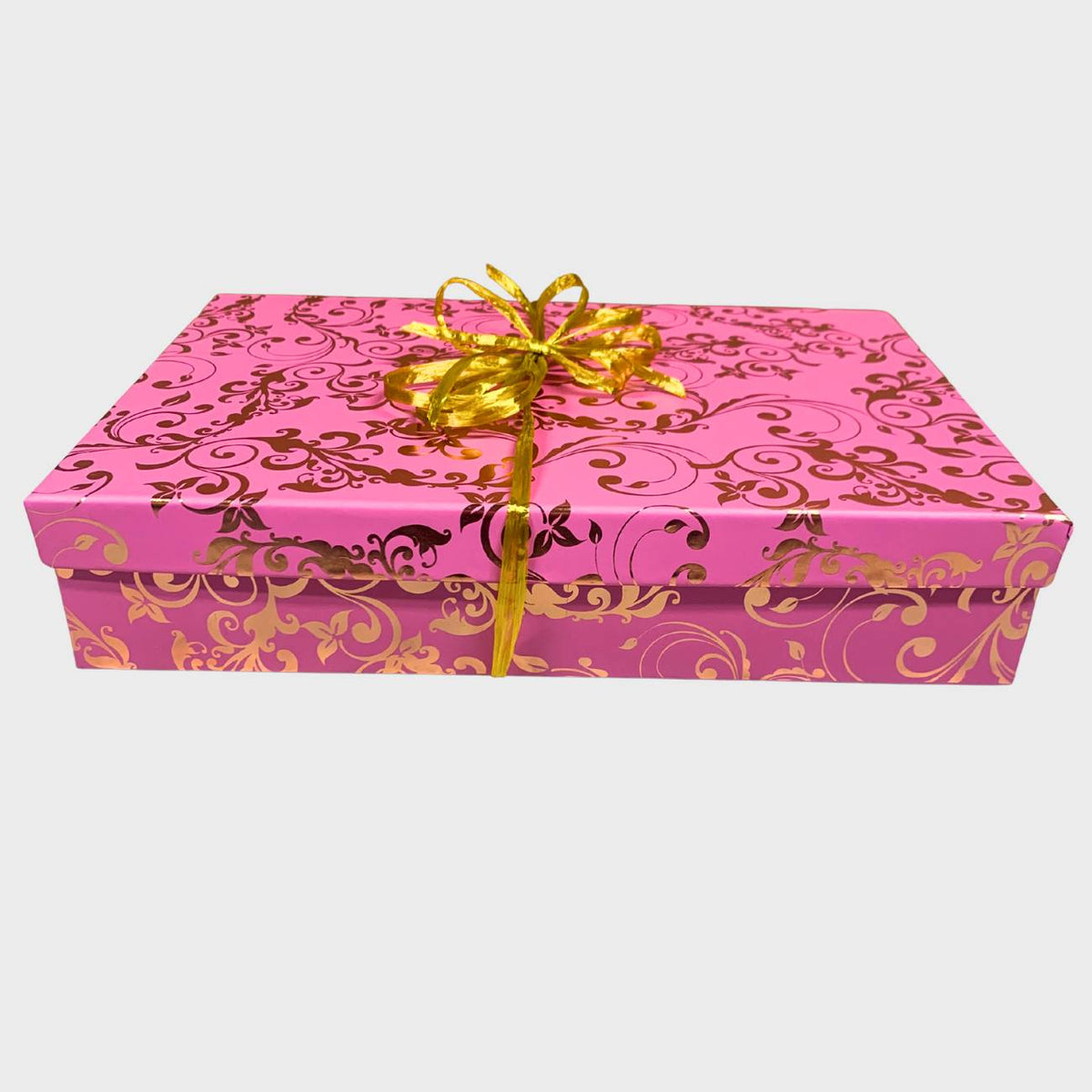 Pink decorative box with gold patterns and a gold ribbon on a white background