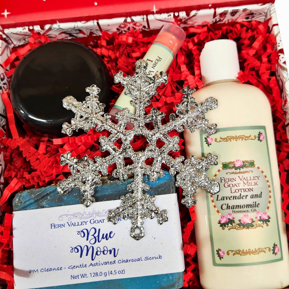Fern Valley Soap Lavender and Chamomile goat milk soap and lotion holiday gift set inside a festive Christmas box.