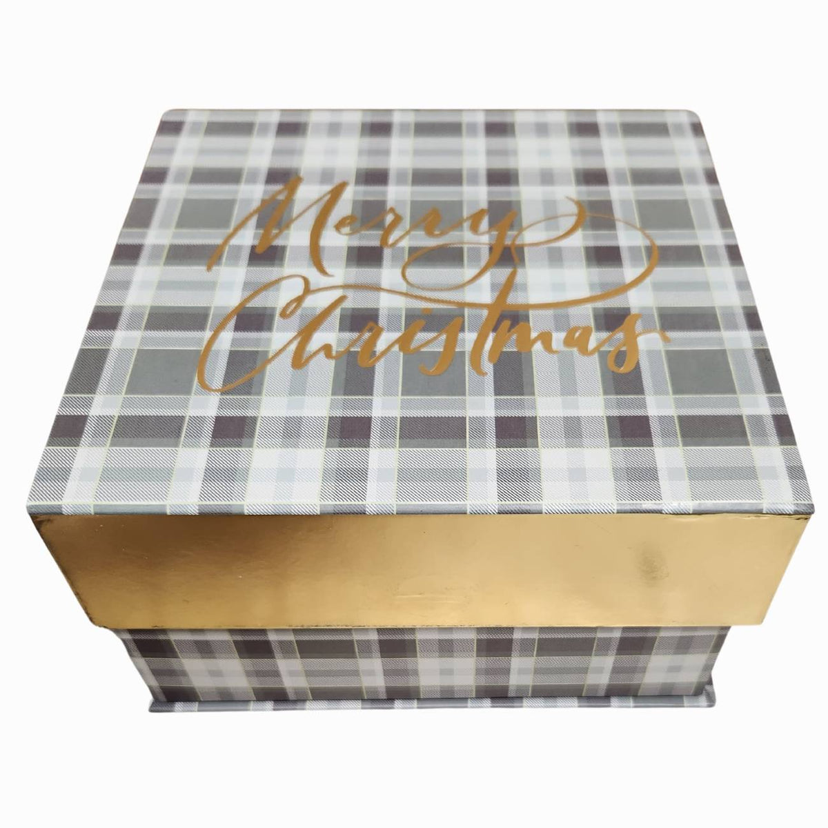 A green plaid gift box with gold trim and the words Merry Christmas in gold on the top.