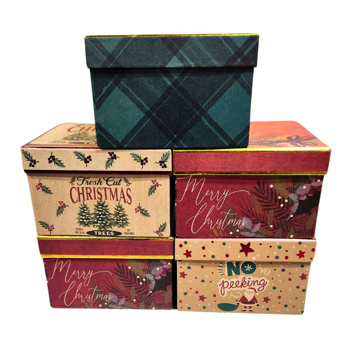 A variety of festive 6x6x5-inch decorative Christmas gift boxes stacked together, featuring holiday designs like snowmen, Santa Claus with "No Peeking" text, and vintage "Fresh Cut Christmas Trees" branding.