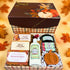 Open Give Thanks Always plaid gift box filled with white crinkle paper, displaying pumpkin apple butter, oatmeal, and autumn jam goat milk soaps, lotion, body butter, a pumpkin shaped soap, and three lip balms.