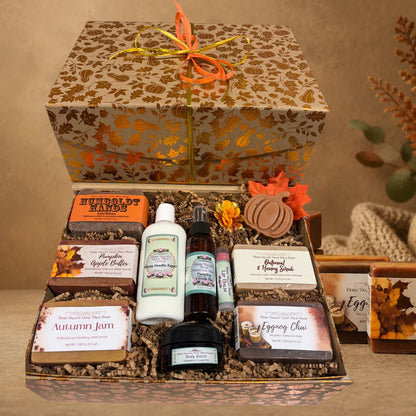 Open autumn harvest gift chest filled with five Fern Valley goat milk soaps, Warm Vanilla Sugar lotion, pumpkin body butter, perfume mist, and a lip balm.