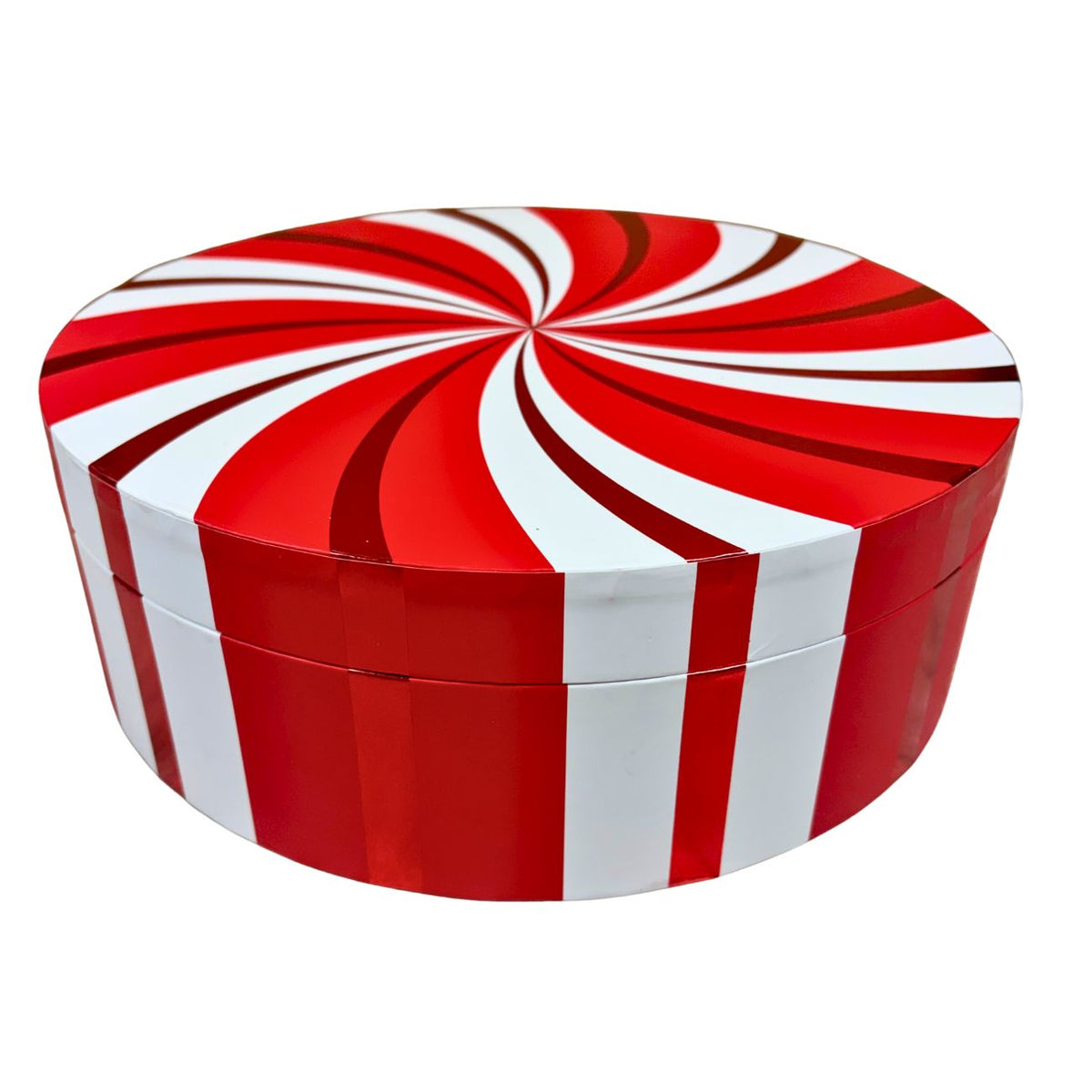 A round holiday gift box with a festive red and white peppermint swirl pattern on the lid and matching stripes.