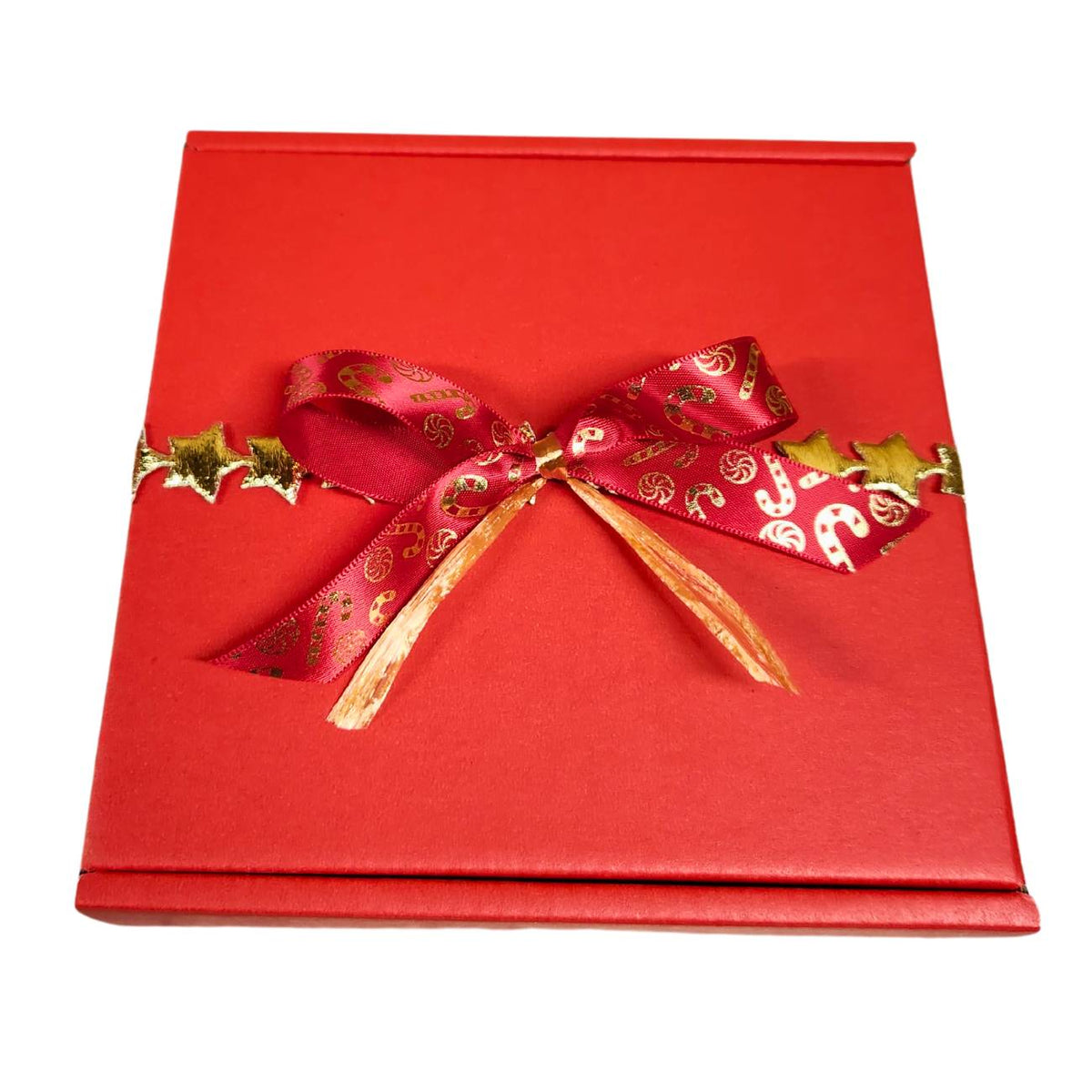 Red gift box with a gold star band and red and gold bow. 