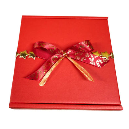 Red gift box with a gold star band and red and gold bow. 