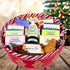 Oversized gingerbread-themed holiday gift tin filled with a colorful arrangement of 13 handcrafted Fern Valley goat milk soaps, body butter, lotion, and an adorable gingerbread man soap.
